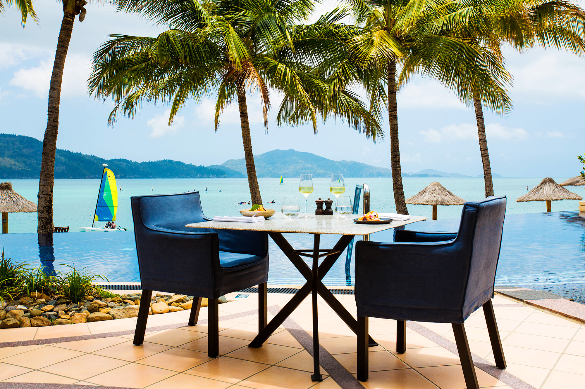 Enjoy breakfast by the pool - Holiday Beach Club holiday packages Hamilton Island 